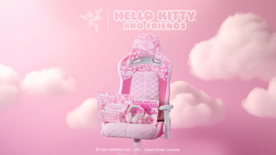 A pink car seat with clouds in the background Description automatically generated