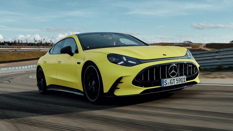 Mercedes-AMG GT 4-Door shown in yellow from a front three-quarter angle