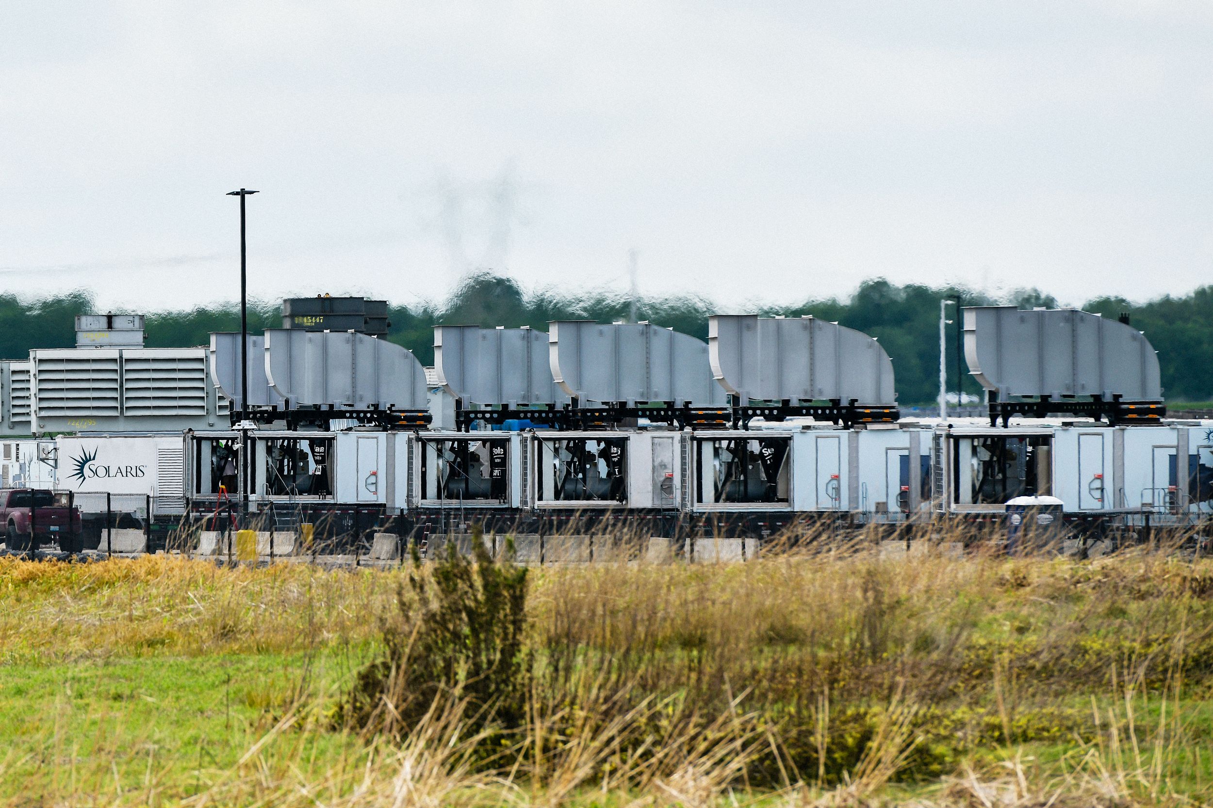 MEMPHIS TN APRIL 25 Gas turbines are visible at an xAI data center on Riverport Rd in Memphis TN on April 25 2025.